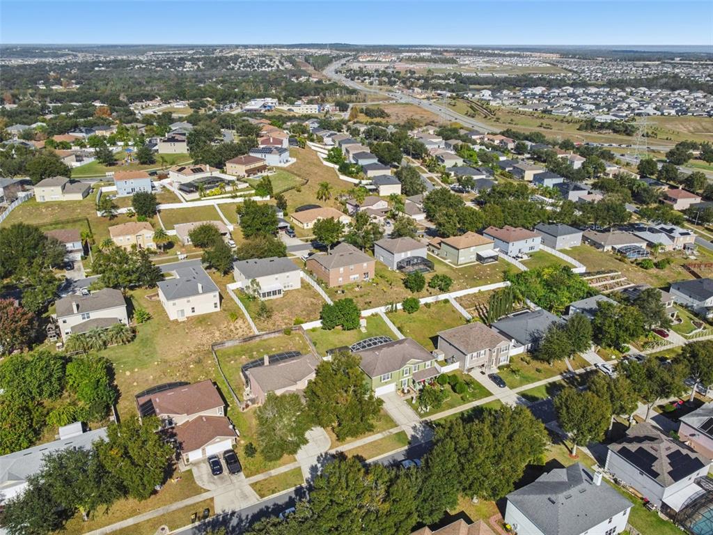 1854 Ridge Valley Street Clermont, FL 34711 - Photo 66 of 73 an aerial view of residential houses with outdoor space