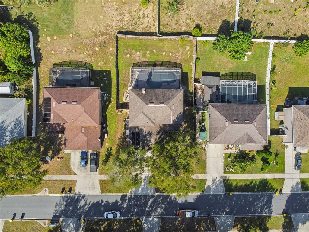 1854 Ridge Valley Street Clermont, FL 34711 - Photo 67 of 73 an aerial view of a house with a garden