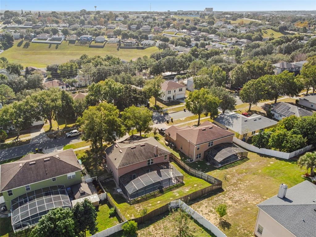 1854 Ridge Valley Street Clermont, FL 34711 - Photo 69 of 73 an aerial view of a house with a lake view