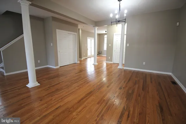 a view of livingroom with hardwood floor and window