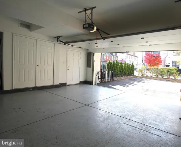 a view of a garage with table and chairs