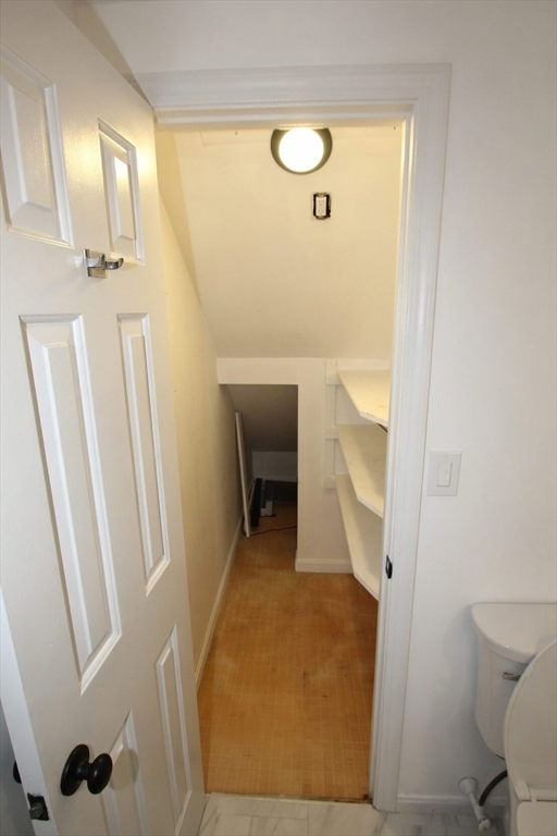 299 Main Street, Unit 2 North Reading, MA 01864 - Photo 20 of 35 a bathroom with a sink and a mirror