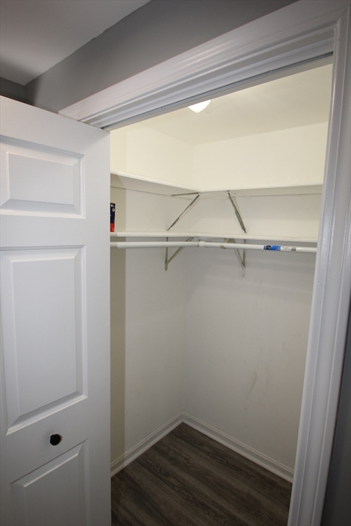 299 Main Street, Unit 2 North Reading, MA 01864 - Photo 24 of 35 a view of an empty walk in closet