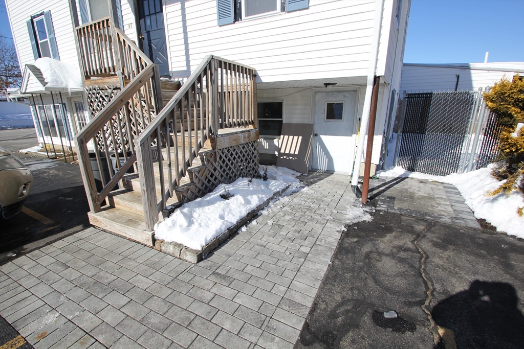 299 Main Street, Unit 2 North Reading, MA 01864 - Photo 3 of 35 a view of entryway livingroom and hall