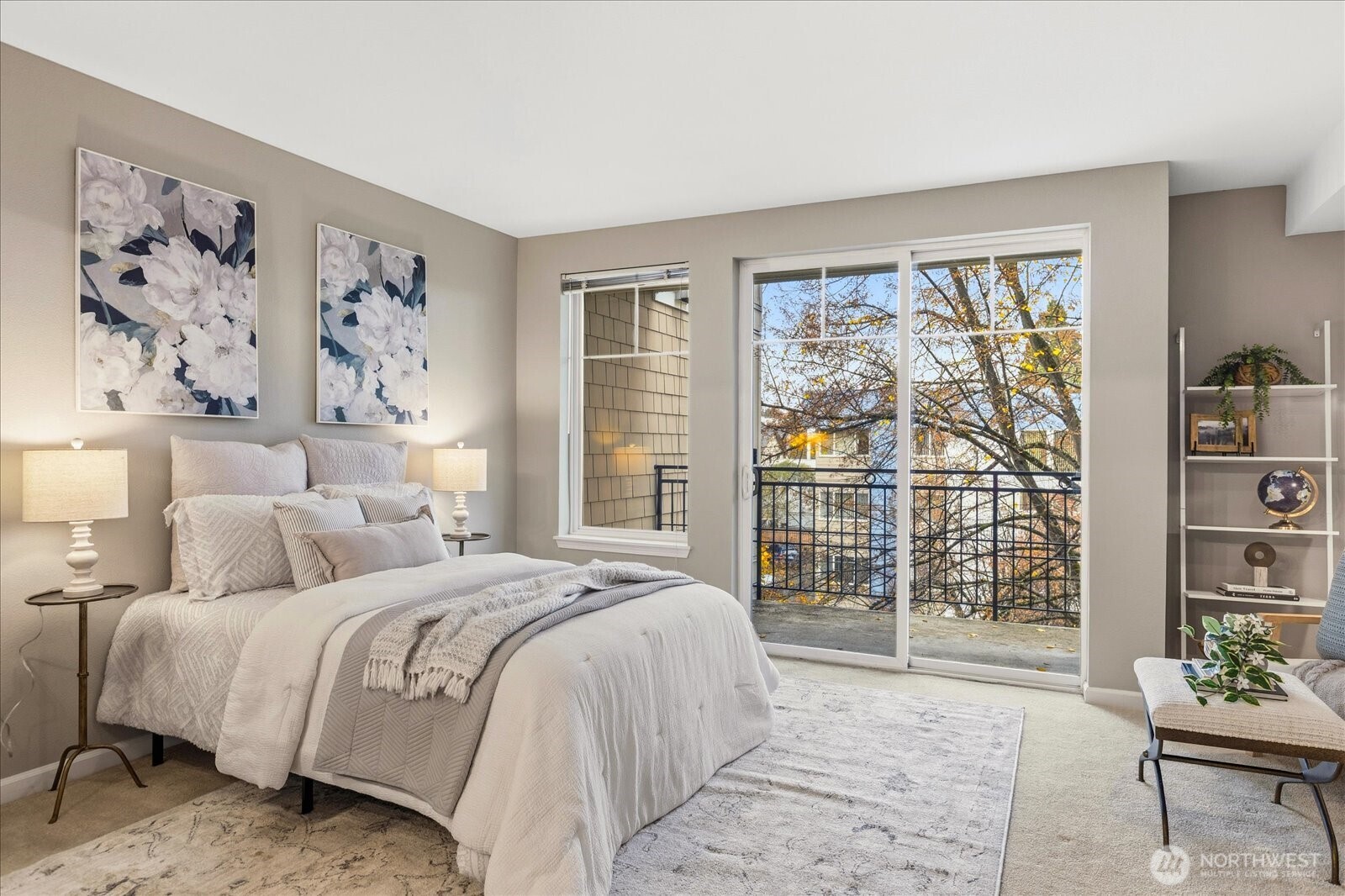 1525 Northwest 57th Street, Unit 429 Seattle, WA 98107 - Photo 11 of 26 a bedroom with a large bed and a window with the outer view
