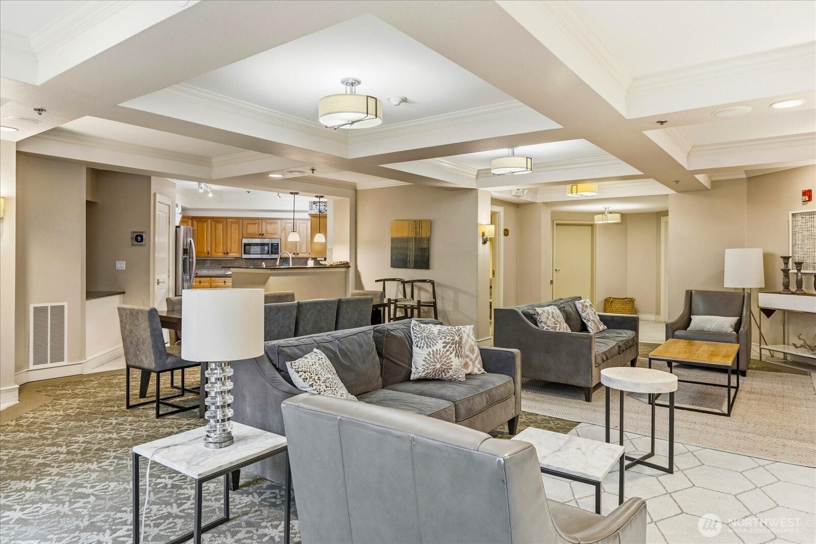 1525 Northwest 57th Street, Unit 429 Seattle, WA 98107 - Photo 22 of 26 a living room with furniture and a view of kitchen
