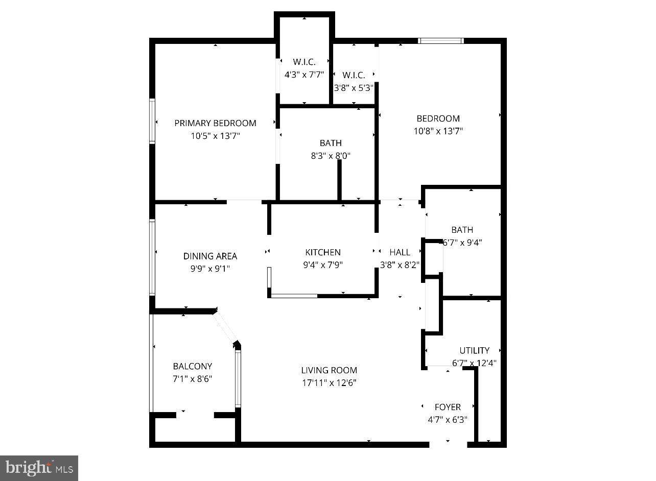 200 Pebble Drive, Unit 207 Rehoboth Beach, DE 19971 - Photo 4 of 7 a picture of a wall with a white and white kitchen