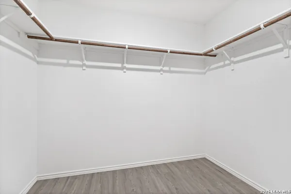 a view of an empty walk in closet