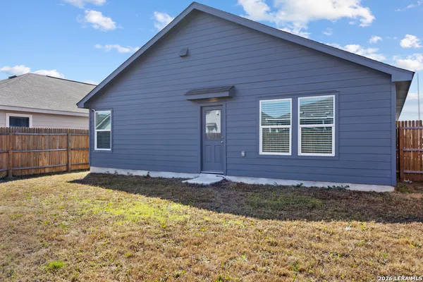 a view of front of a house with a yard