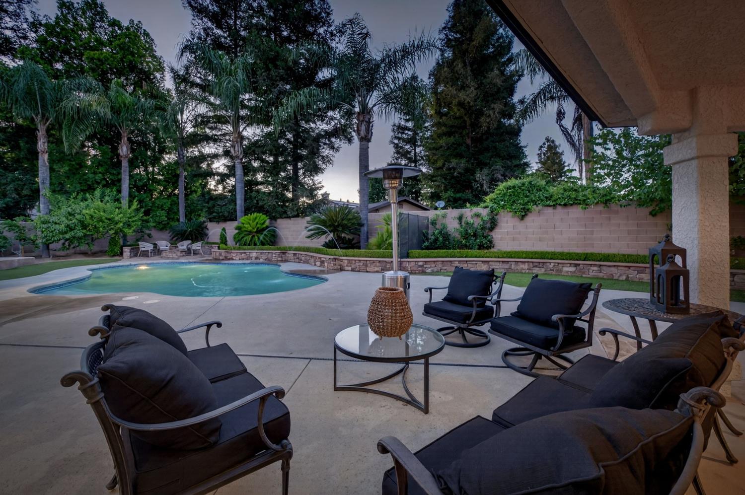 601 Decatur Avenue Clovis, CA 93611 - Photo 48 of 62 a backyard view of a house with outdoor seating
