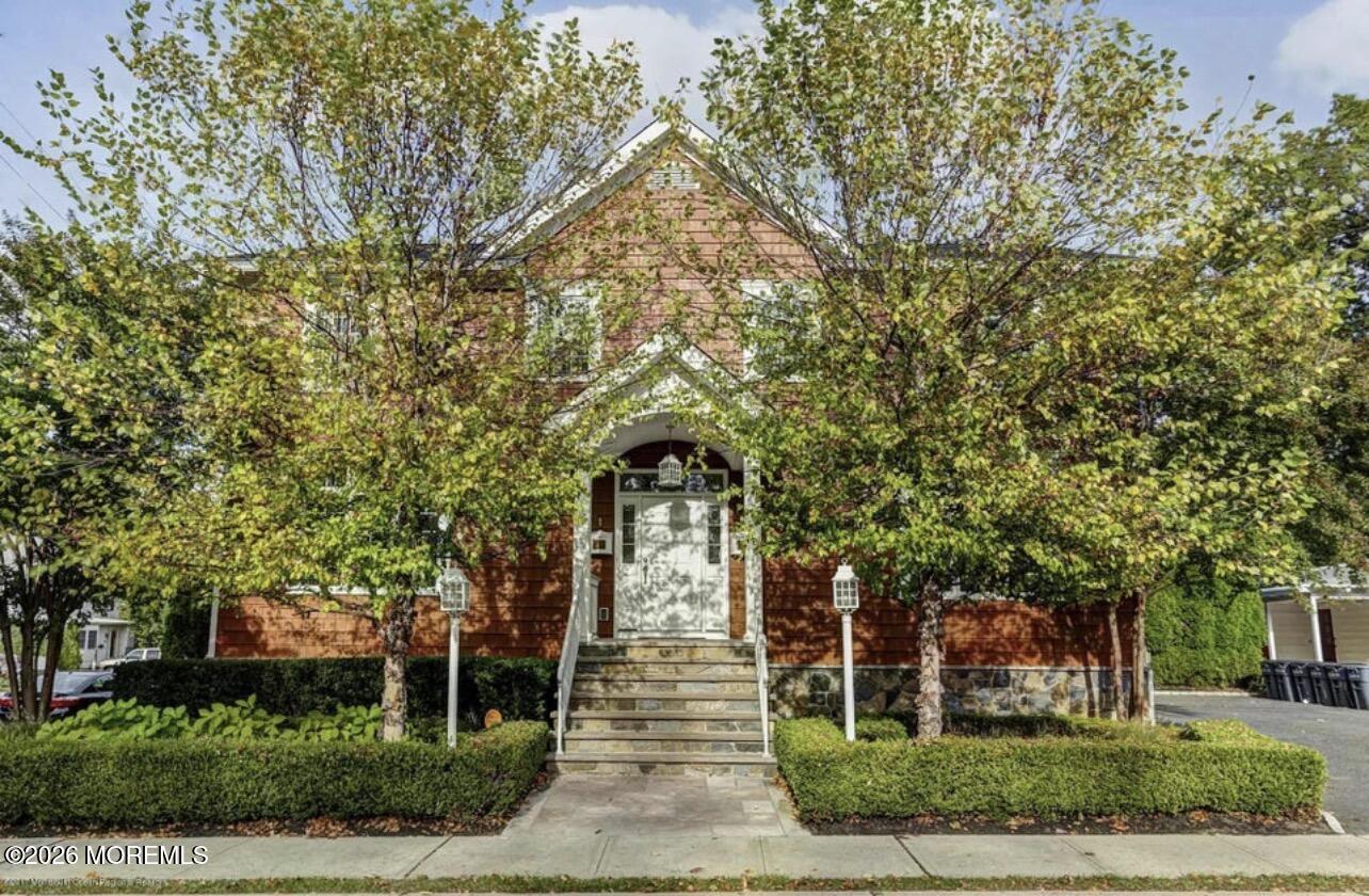 1-3 Church Street Matawan, NJ 07747 - Photo 18 of 28 a front view of a house with garden