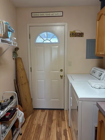 a view of a storage and utility room with a sink