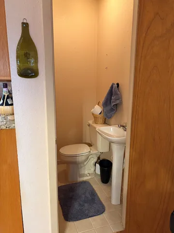 a bathroom with a toilet and a sink