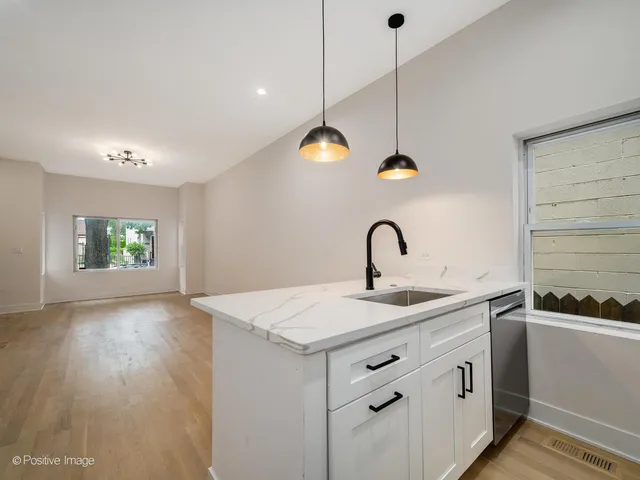 a bathroom with a sink and a vanity