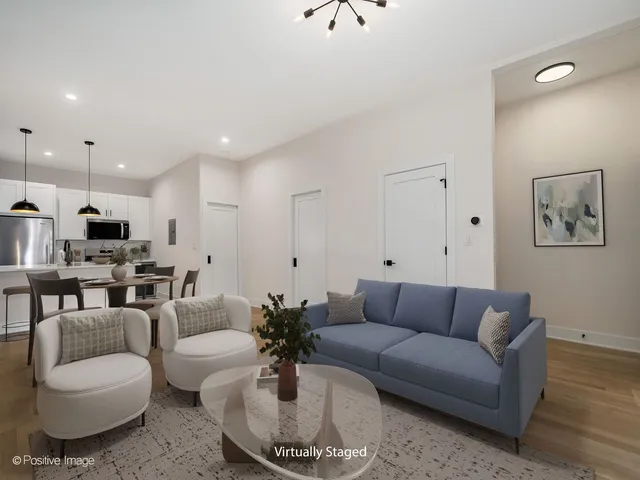 a living room with furniture or kitchen and a couch