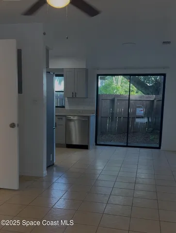 a view of a kitchen with a sink and a kitchen