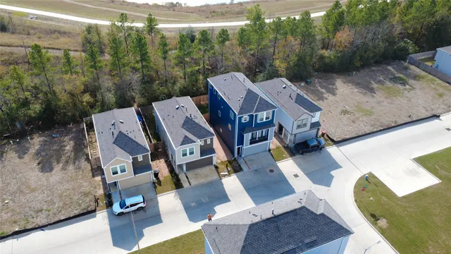 a view of a patio with table and chairs a barbeque with potted plants