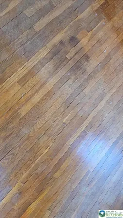 a room view with wooden floor