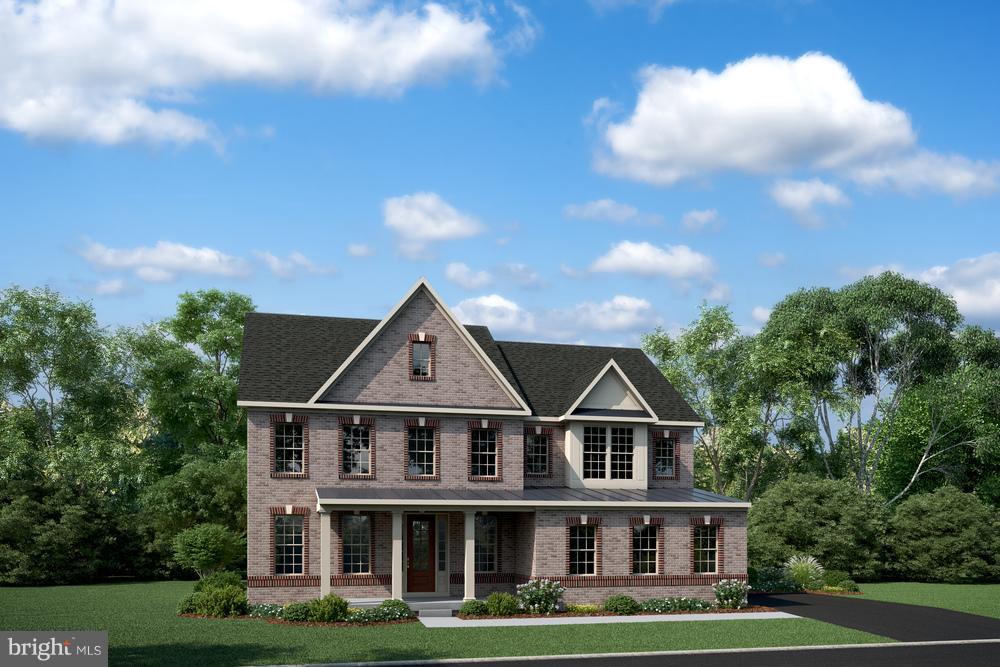 20358 Peach Tree Road Dickerson, MD 20842 - Photo 1 of 18 a front view of a house with a garden and trees in the background
