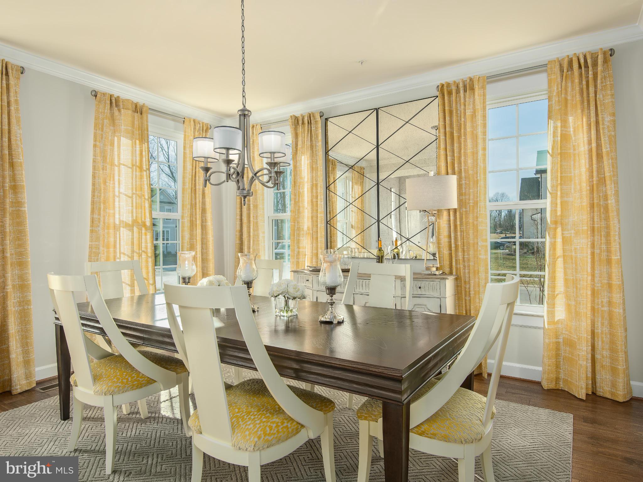 20358 Peach Tree Road Dickerson, MD 20842 - Photo 4 of 18 a view of a dining room with furniture and wooden floor