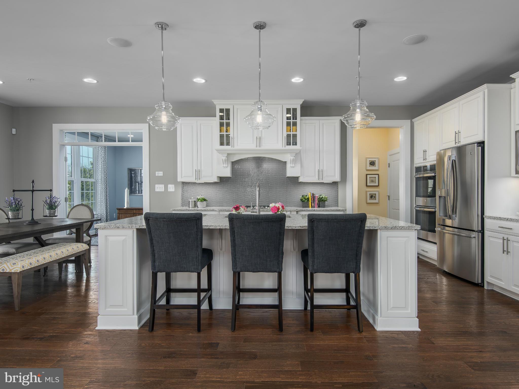 20358 Peach Tree Road Dickerson, MD 20842 - Photo 5 of 18 a large kitchen with a table and chairs