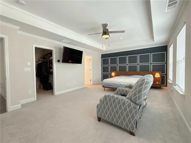 a view of livingroom with furniture and ceiling fan