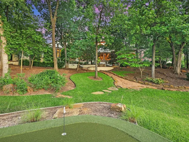 a view of backyard with green space