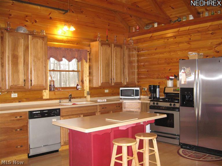 1600 Stroup Road Atwater, OH 44201 - Photo 3 of 24 GREAT ROOM INCLUDES KITCHEN ..... STAINLESS APPLIANCES & ISLAND..........