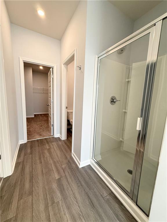 247 Centennial Circle Canton, GA 30114 - Photo 24 of 25 a view of a bathroom with a glass door
