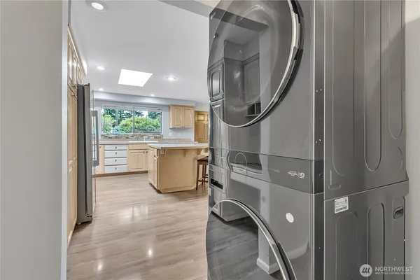 a room with walk in closet and a window