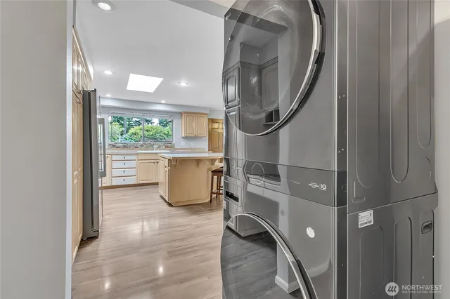 a room with walk in closet and a window