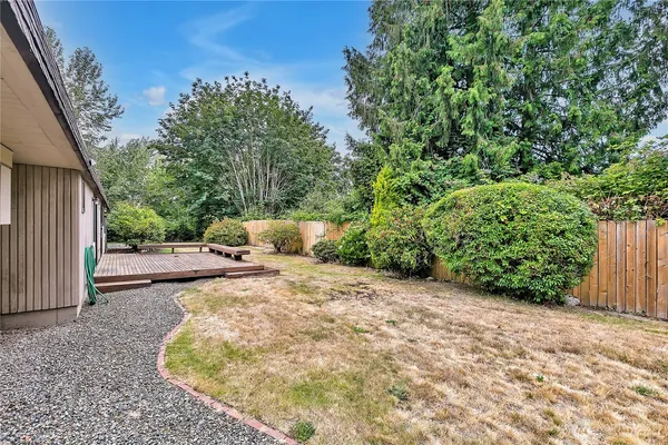 a view of a back yard of the house