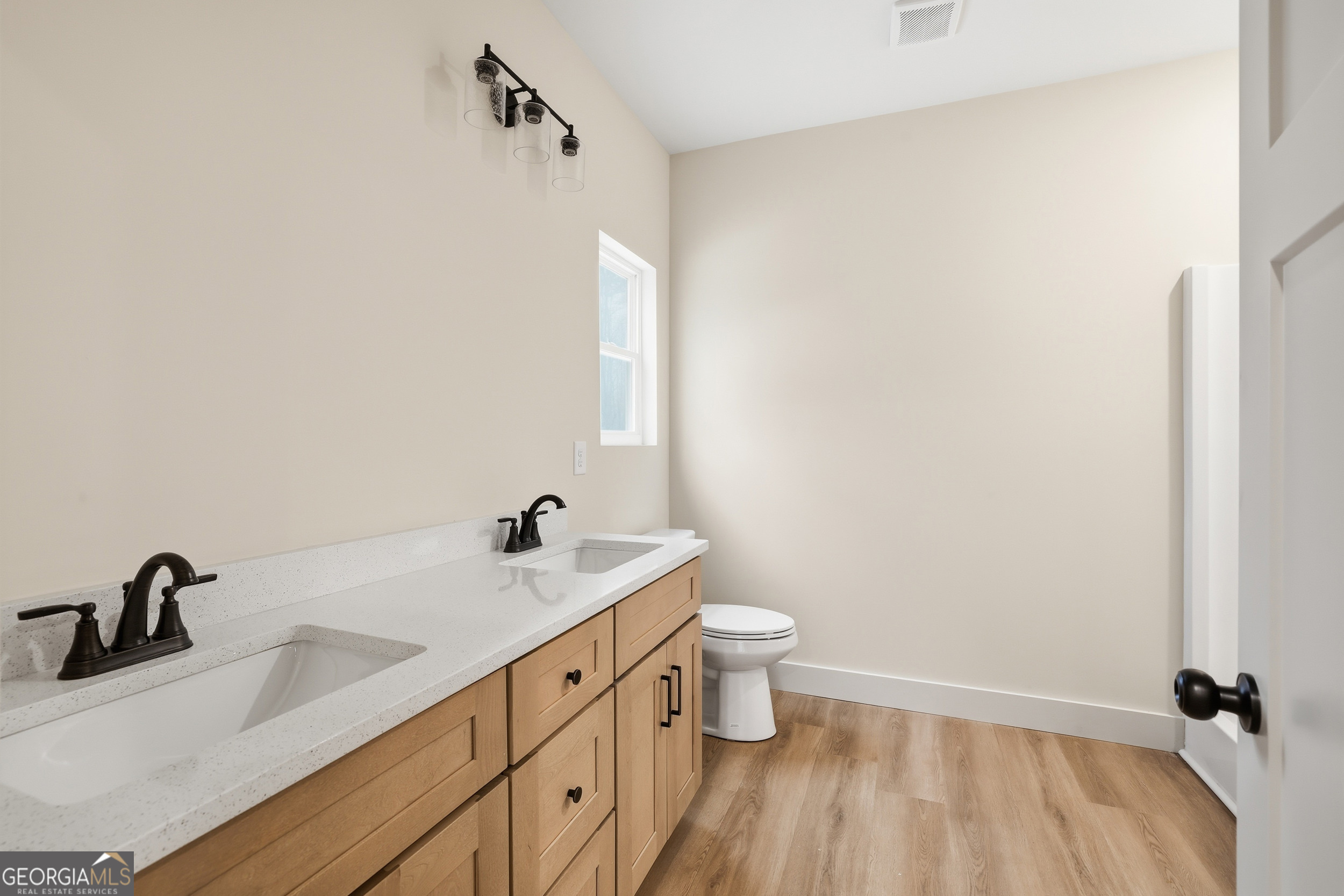 146 James Road Clarkesville, GA 30523 - Photo 11 of 25 a bathroom with a sink and a mirror