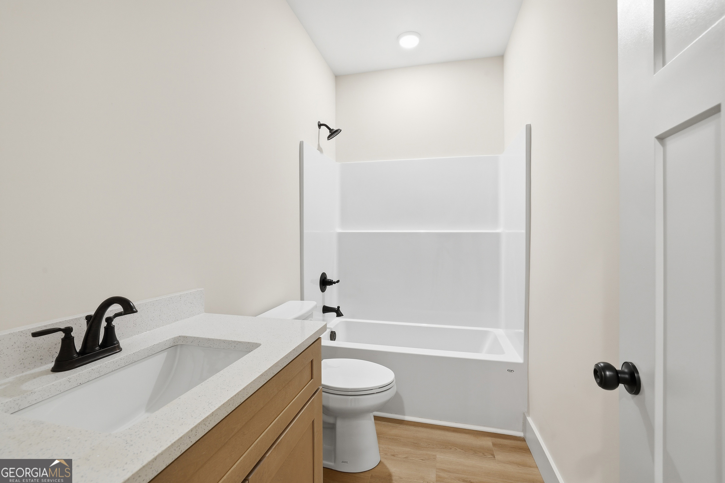 146 James Road Clarkesville, GA 30523 - Photo 15 of 25 a bathroom with a sink a toilet and shower