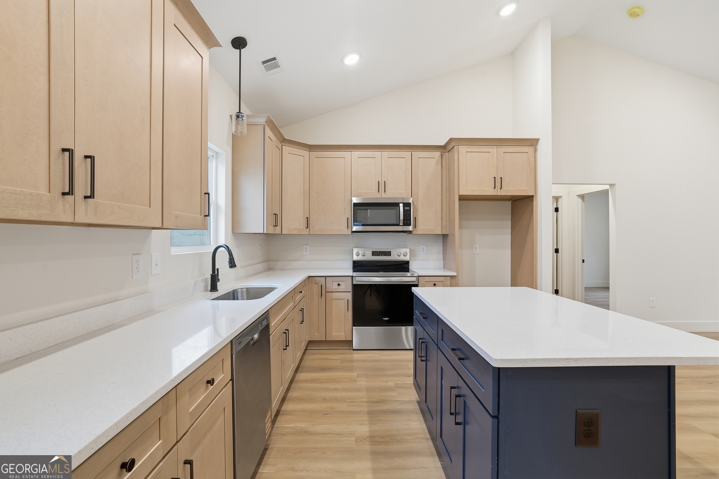 146 James Road Clarkesville, GA 30523 - Photo 7 of 25 a kitchen with a sink stove top oven and refrigerator