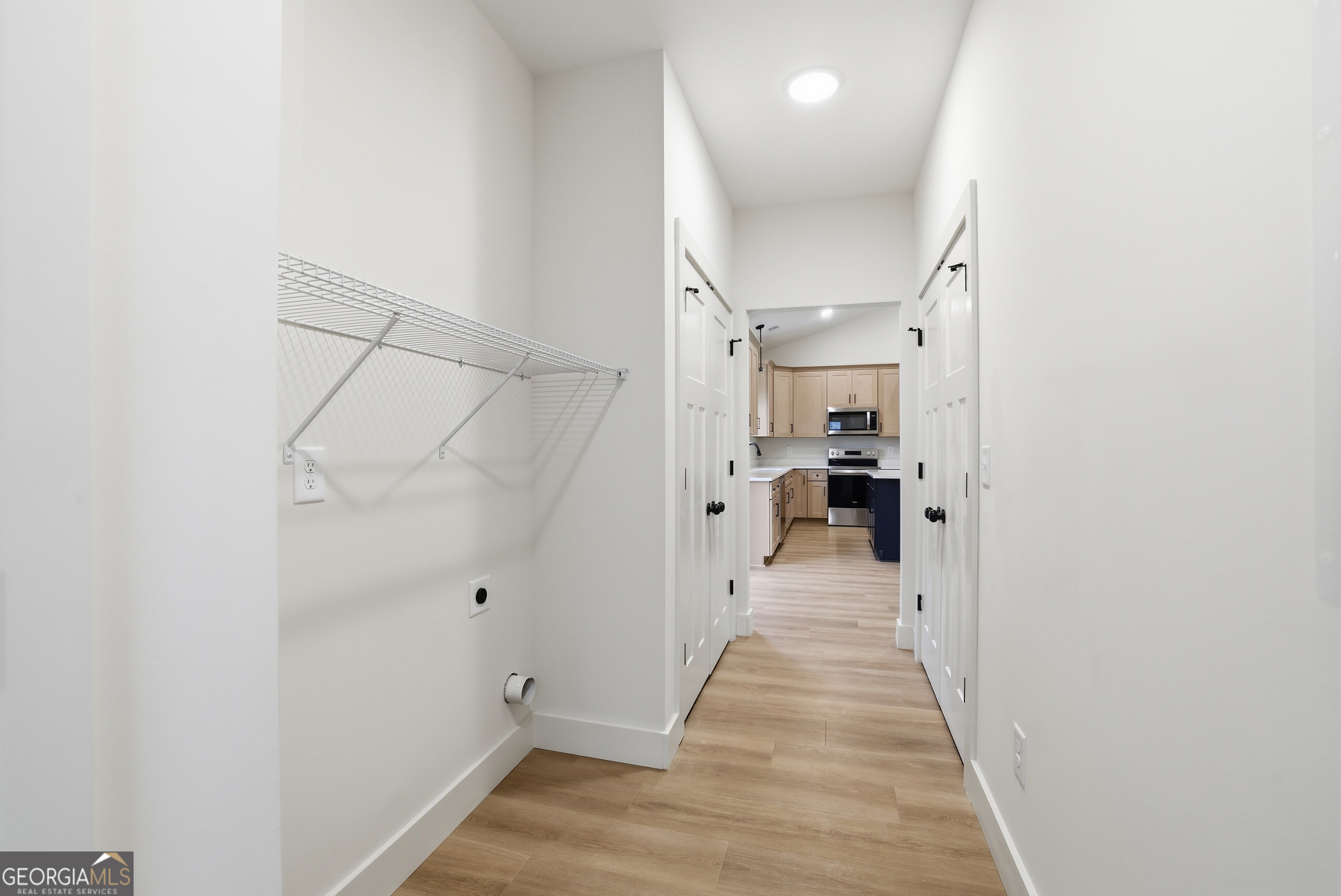 146 James Road Clarkesville, GA 30523 - Photo 8 of 25 a view of a hallway with white walls