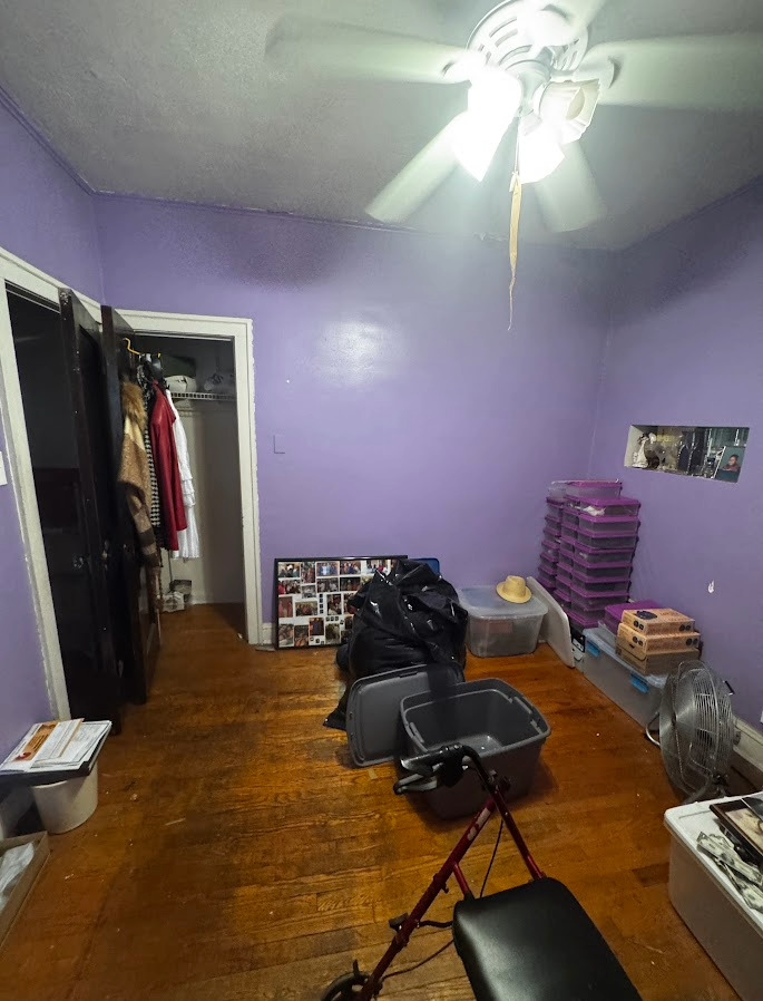 7940 South Marshfield Avenue Chicago, IL 60620 - Photo 4 of 4 a bedroom with furniture and a closet