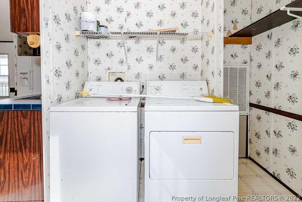 256 Union Church Road Carthage, NC 28327 - Photo 20 of 29 a utility room with dryer and washer