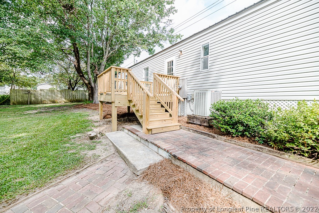 256 Union Church Road Carthage, NC 28327 - Photo 24 of 29 a view of a house with a yard
