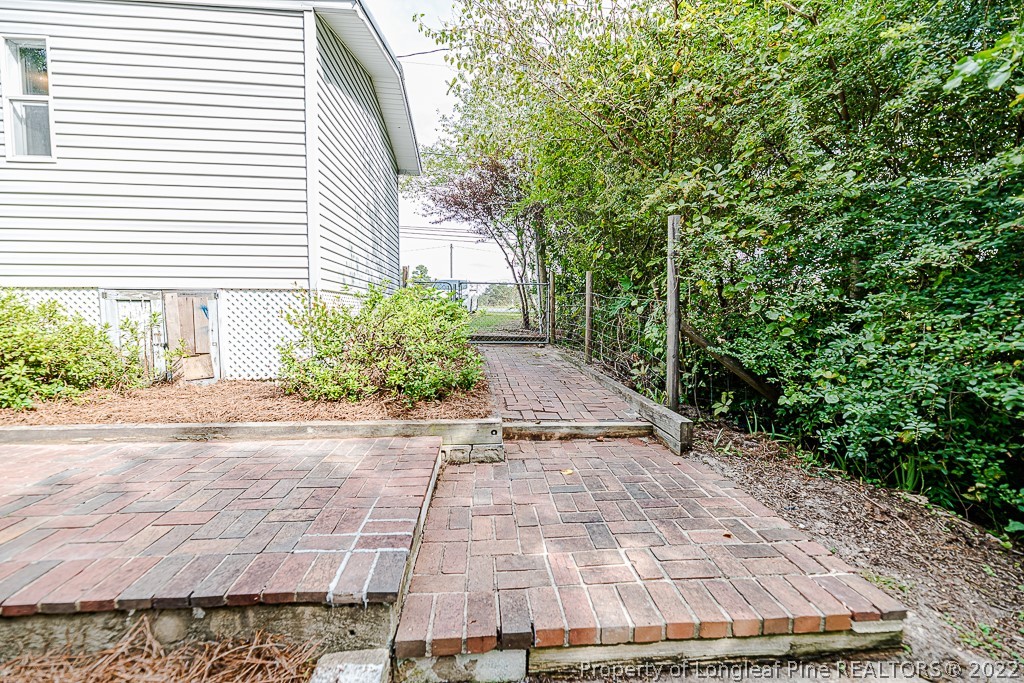 256 Union Church Road Carthage, NC 28327 - Photo 25 of 29 a view of a backyard of the house