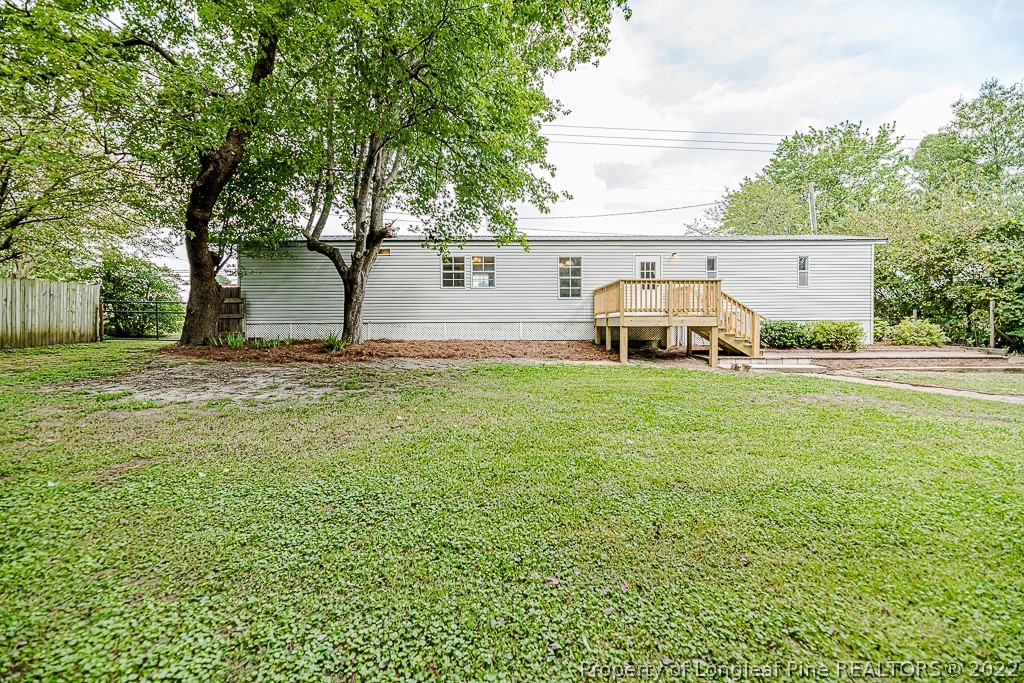 256 Union Church Road Carthage, NC 28327 - Photo 29 of 29 a view of a house with backyard and trees