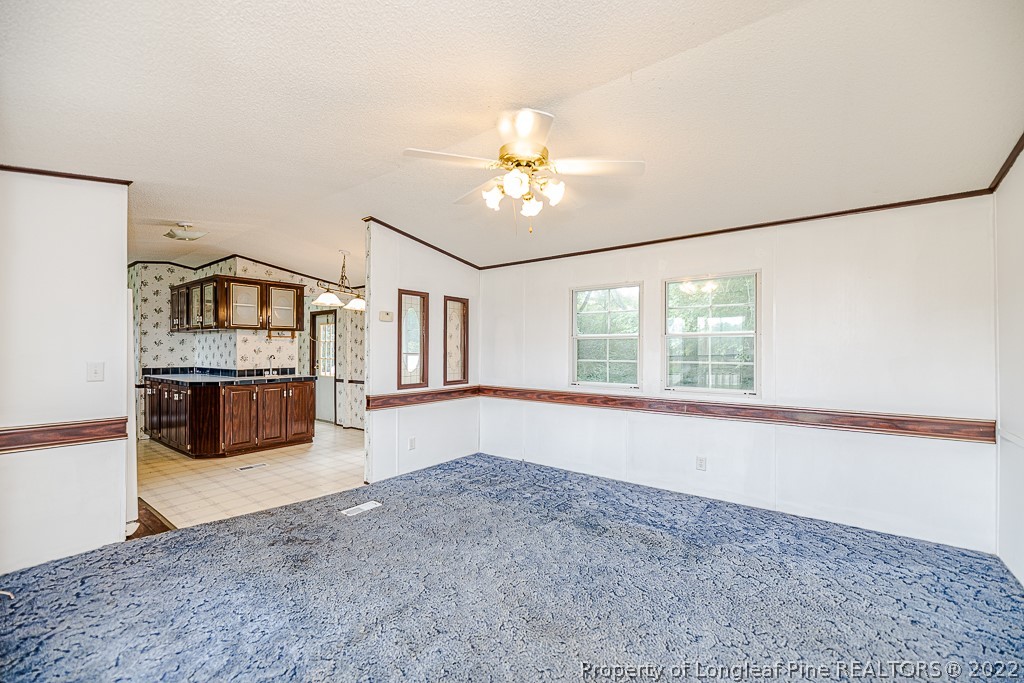 256 Union Church Road Carthage, NC 28327 - Photo 5 of 29 a view of an empty room with a window
