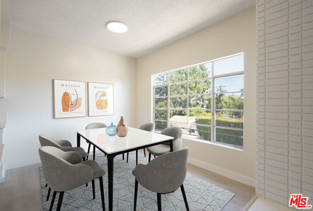 1677 Westholme Avenue Los Angeles, CA 90024 - Photo 16 of 43 a view of a dining room with furniture window and outside view