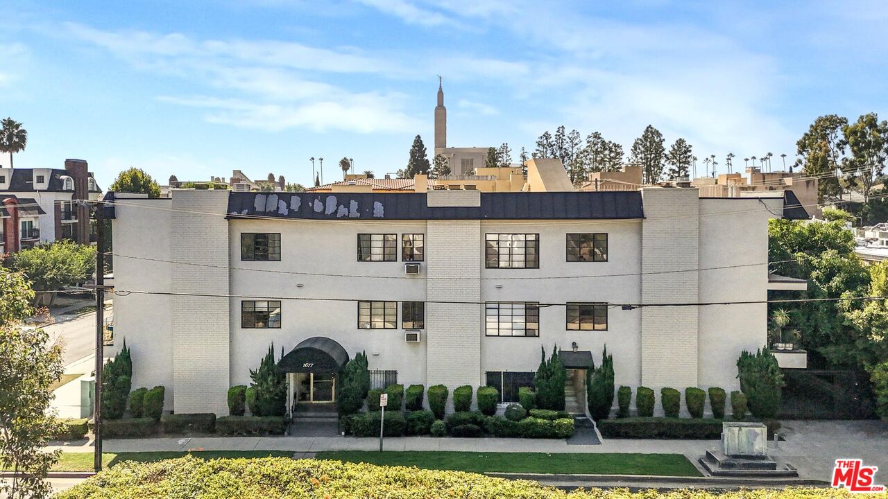 1677 Westholme Avenue Los Angeles, CA 90024 - Photo 2 of 43 a front view of a building with garden