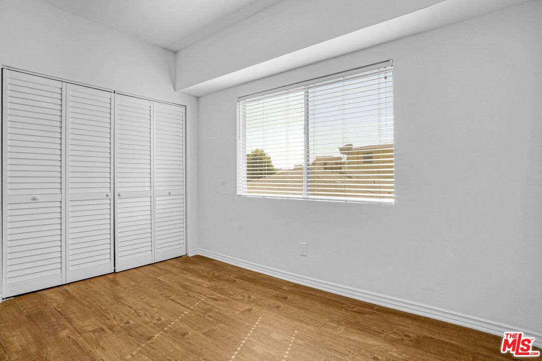 1677 Westholme Avenue Los Angeles, CA 90024 - Photo 21 of 43 a view of an empty room with a window