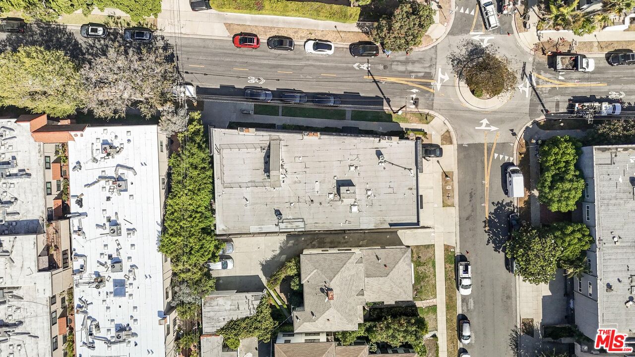 1677 Westholme Avenue Los Angeles, CA 90024 - Photo 38 of 43 a aerial view of a house with a yard and large trees
