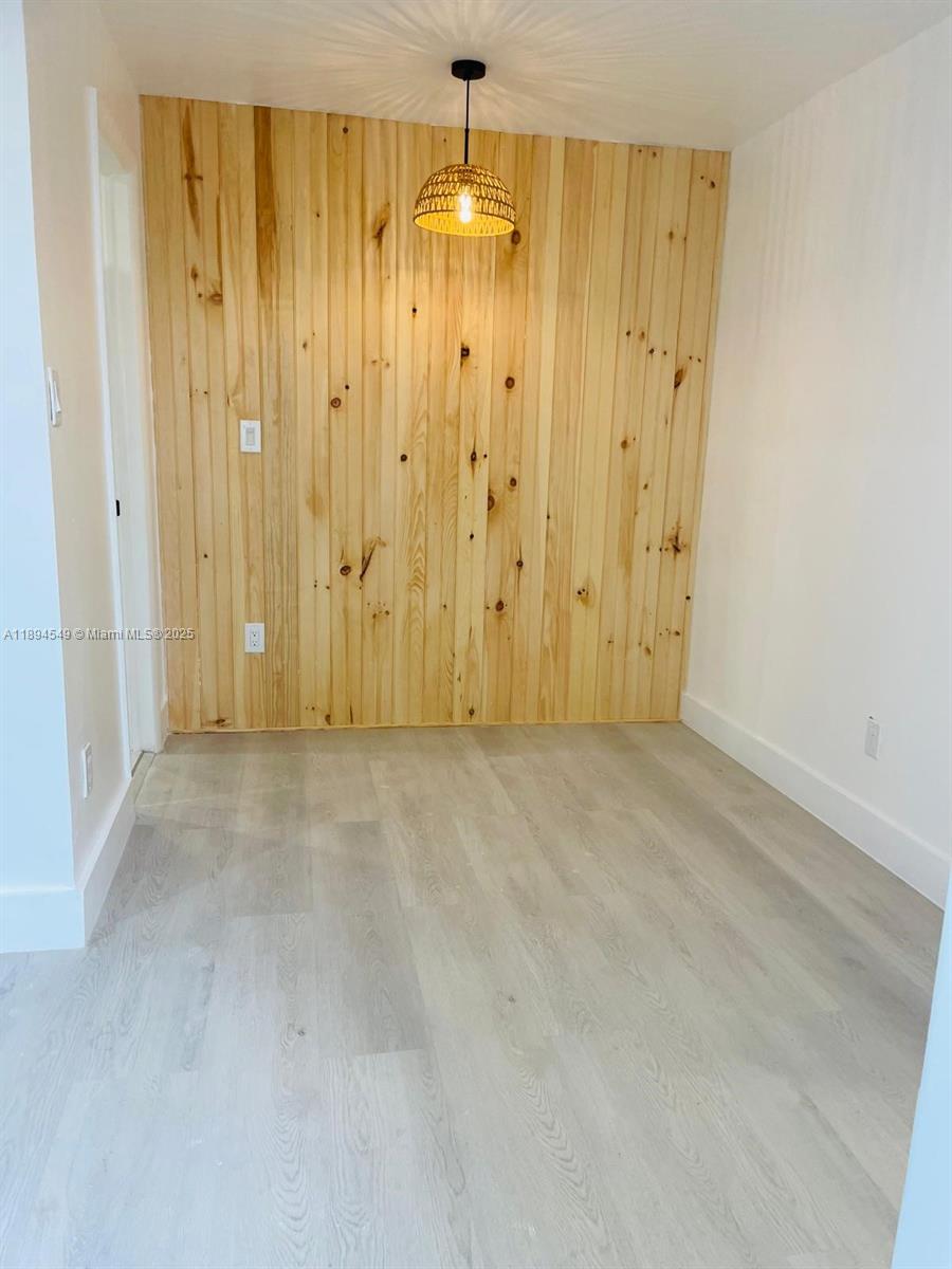 3731 Southwest 58th Terrace Davie, FL 33314 - Photo 13 of 17 a view of a hallway with chandelier