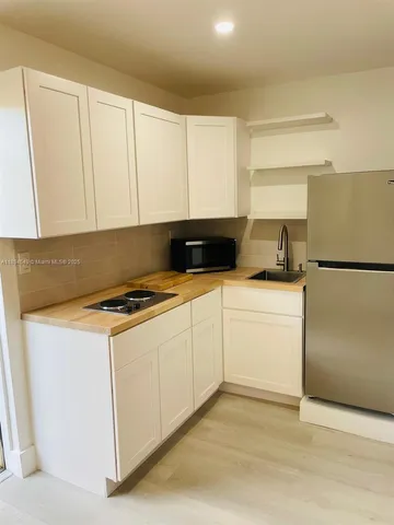 a utility room with washer and dryer