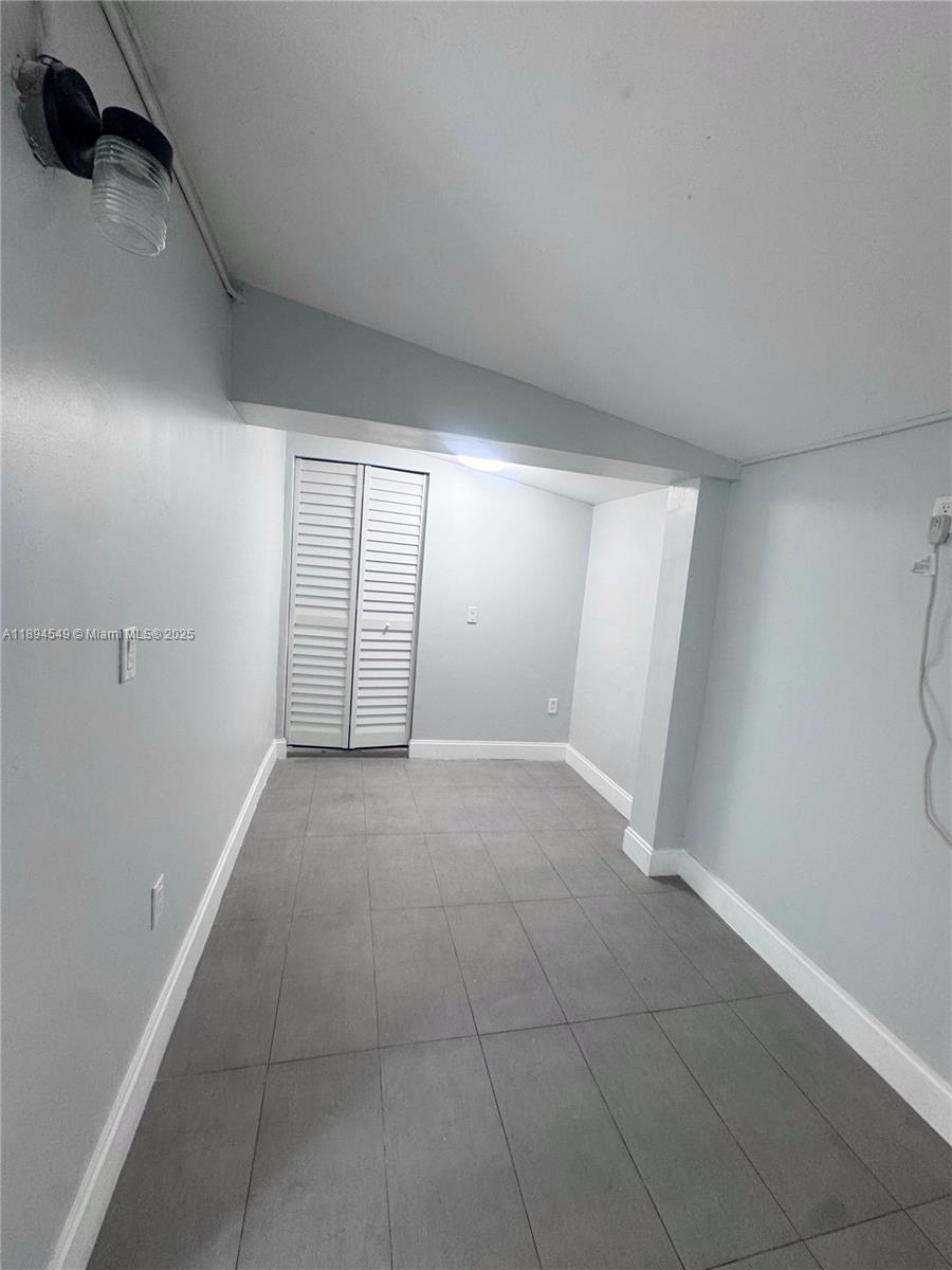 3731 Southwest 58th Terrace Davie, FL 33314 - Photo 17 of 17 a view of an empty room and a window