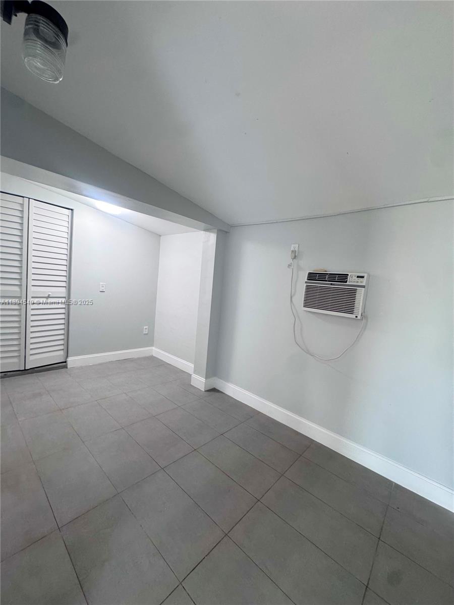 3731 Southwest 58th Terrace Davie, FL 33314 - Photo 7 of 17 an empty room with windows